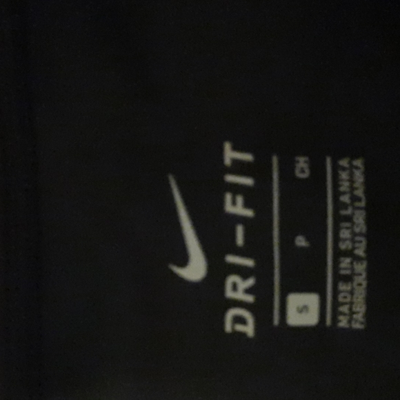 Nike leggings.  Mesh bottom from the knee down. Size small. Black and a pink. - Picture 2 of 4